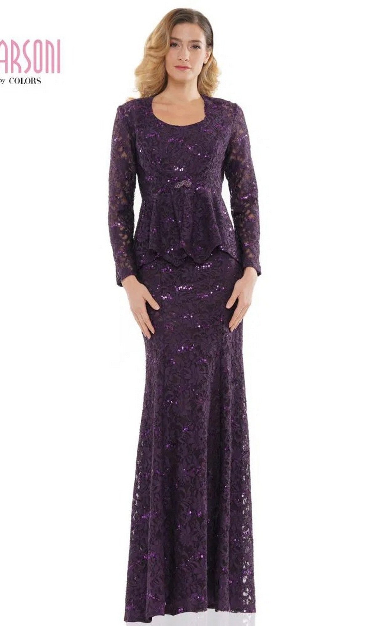 A woman wears the Marsoni M301, a long-sleeved, floor-length purple formal dress with a peplum waist, standing against a white background.